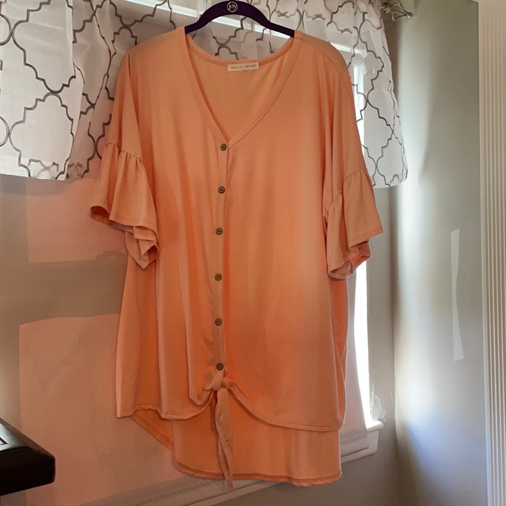 Pink soft shirt . Never won no tags